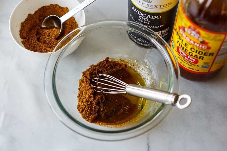 Tossing the dressing together