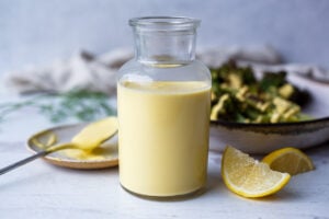 This Vegan Hollandaise Sauce is decadently creamy AND healthy! Perfect for roasted vegetables, baked potatoes, vegan benedicts, breakfast scrambles, braised greens and so much more. Easy to make in under 20 minutes!