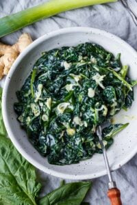 Rich and luscious Coconut Creamed Spinach has a silky melt-in-your-mouth texture. Simple to put together and makes an easy delicious side dish. Vegan and Gluten-Free!