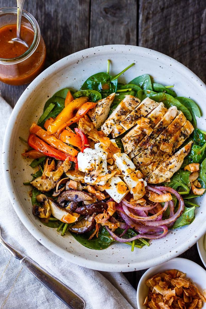 30 Fresh & Healthy Summer Dinner Ideas! spinach salad with grilled mushrooms, red onions, peppers, and grilled chicken topped with coconut bacon, feta, and French dressing.