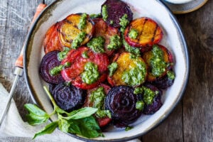 These Grilled Beets are perfectly tender with a rich caramelized flavor. Top with pesto for over-the-top deliciousness. Perfect as a side dish, or add to salads, toasts and bowls.