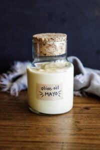 This simple, easy mayonnaise recipe is made with olive oil and can be made in a blender, food processor, whisked by hand, or use an immersion blender. Keep it in the fridge for up to 3 weeks!