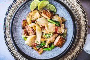 Pad See Ew is a delicious Thai stir-fried noodle dish using wide rice noodles, Chinese broccoli, eggs, your choice of protein ( chicken, tofu, shrimp) and a flavorful sweet soy stir-fry sauce.