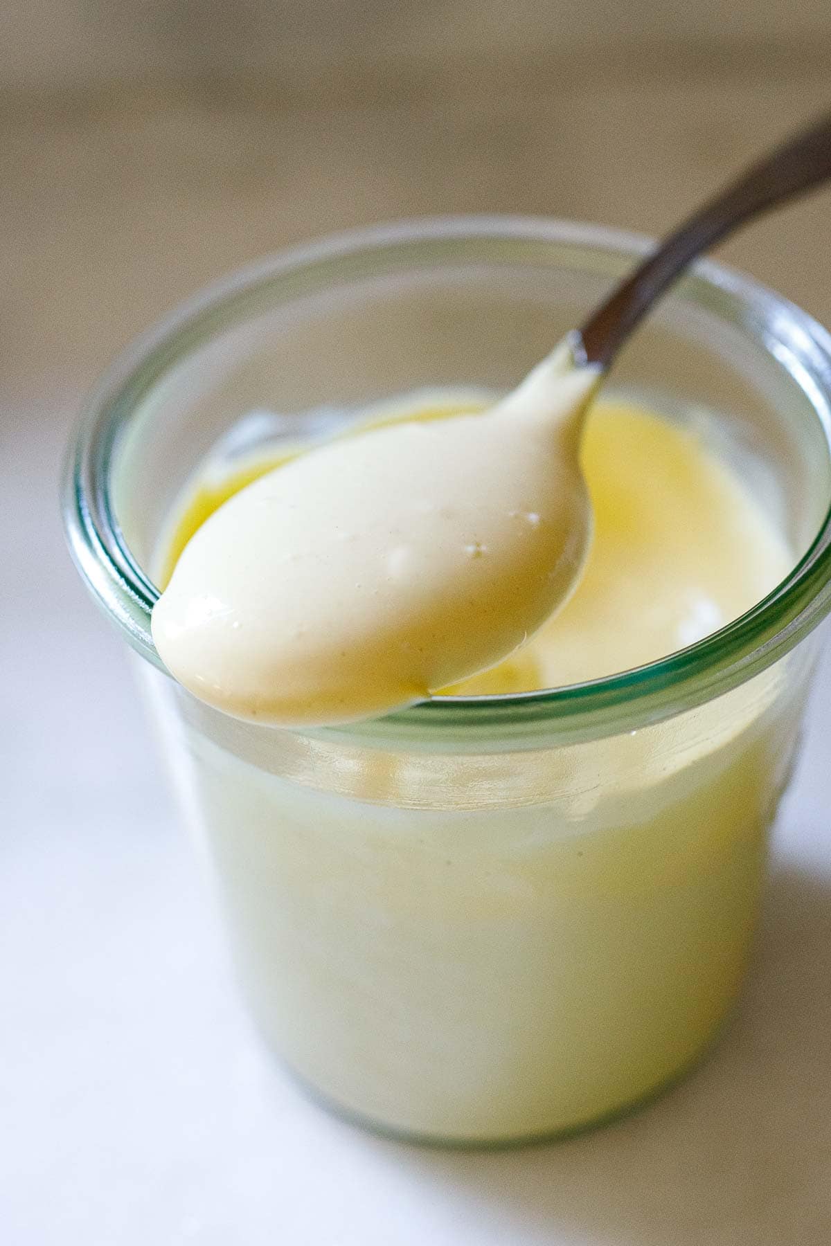 This homemade mayonnaise recipe is made with olive oil and can be made with an immersion blender, food processor, or whisk by hand. Keep it in the fridge for up to 3 weeks! Vegan? Try our Vegan Mayo!