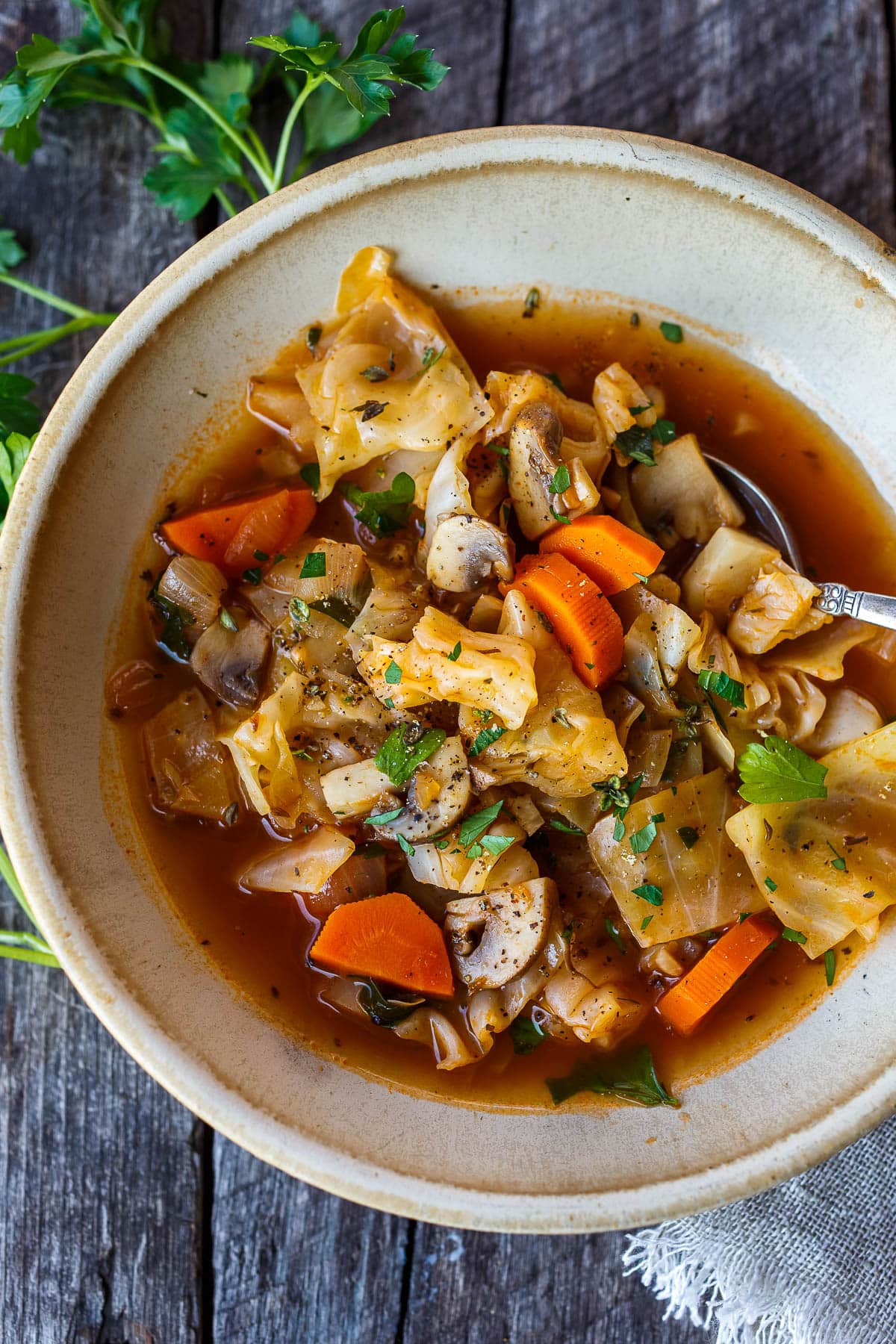 Simple clean ingredients full of comforting flavors, this Cabbage Soup is healthy, satisfying and easy to make. Perfect for busy weekdays and leftovers are delicious! Vegan.