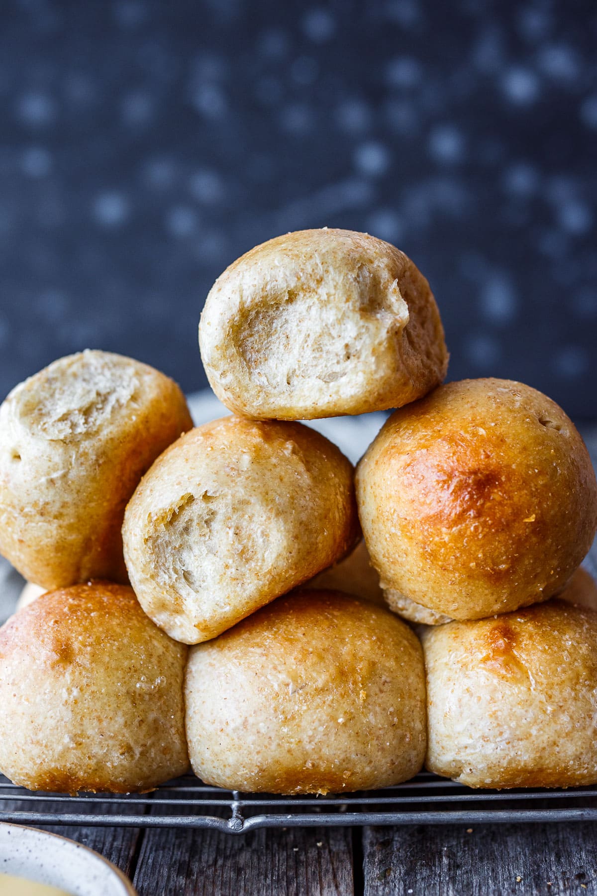 Perfectly tender and ultra flavorful sourdough dinner rolls are made completely with active starter, no yeast. Make in one day or refrigerate overnight. They freeze well and are vegan adaptable!