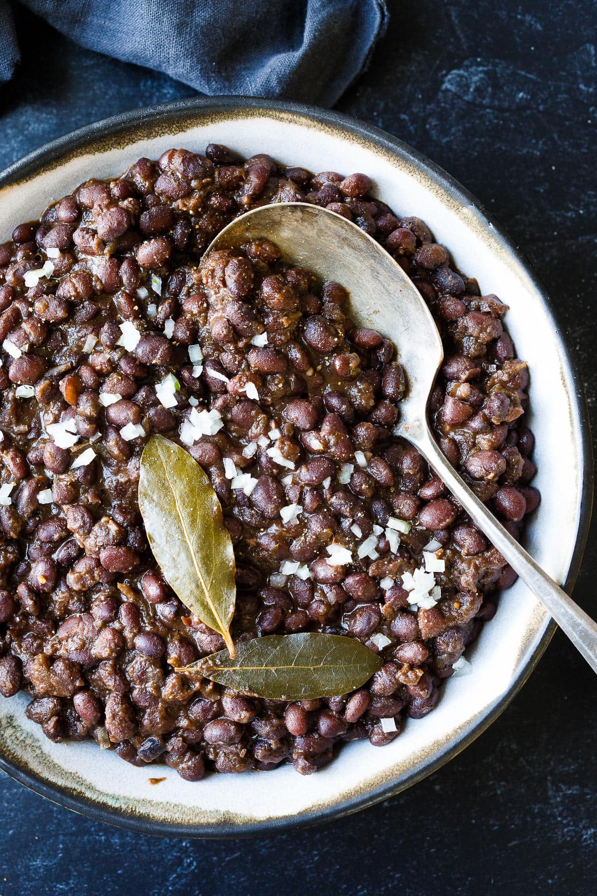 Full of savory flavor, these Cuban Style Black Beans are made with dry black beans and simple seasonings. A healthy side dish that will complement many dishes. The recipe card includes instructions for Stove Top, Instant Pot, and canned beans. Vegan!