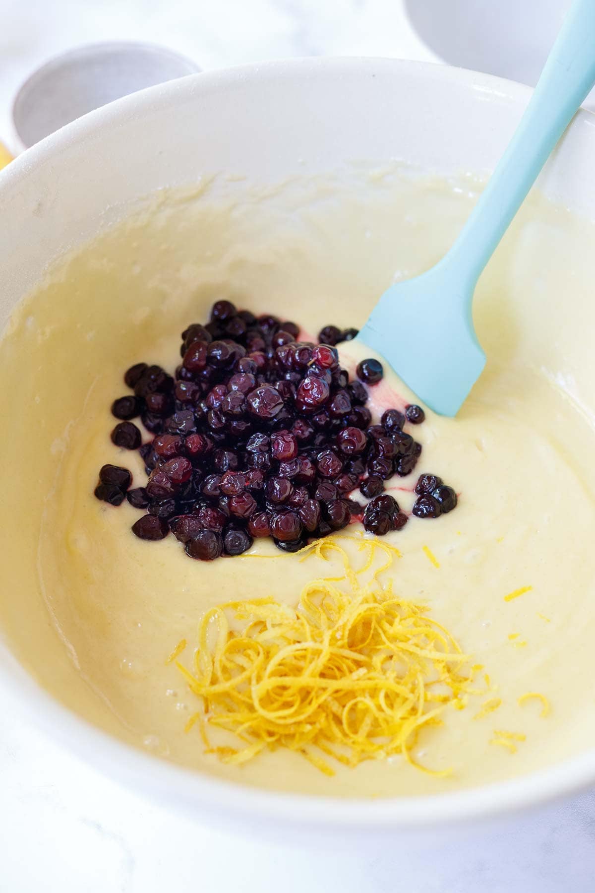 fold in lemon zest and huckleberries.