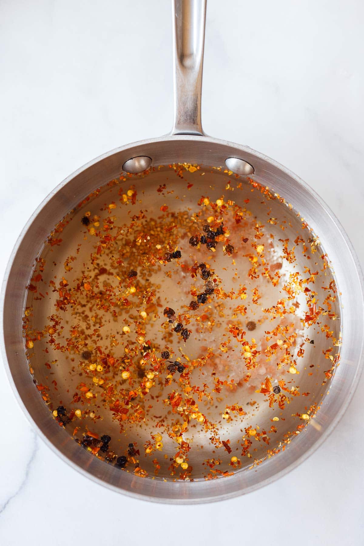 pickling liquid in a saucepan for Dilly Beans.
