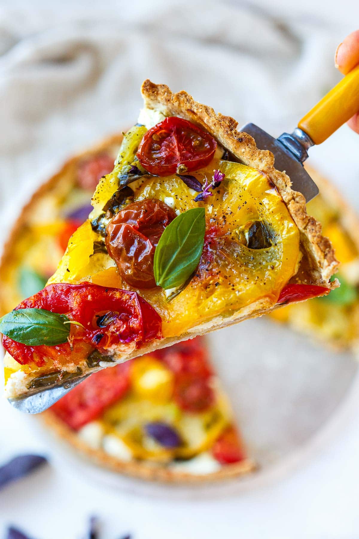 A slice of heirloom tomato tart.