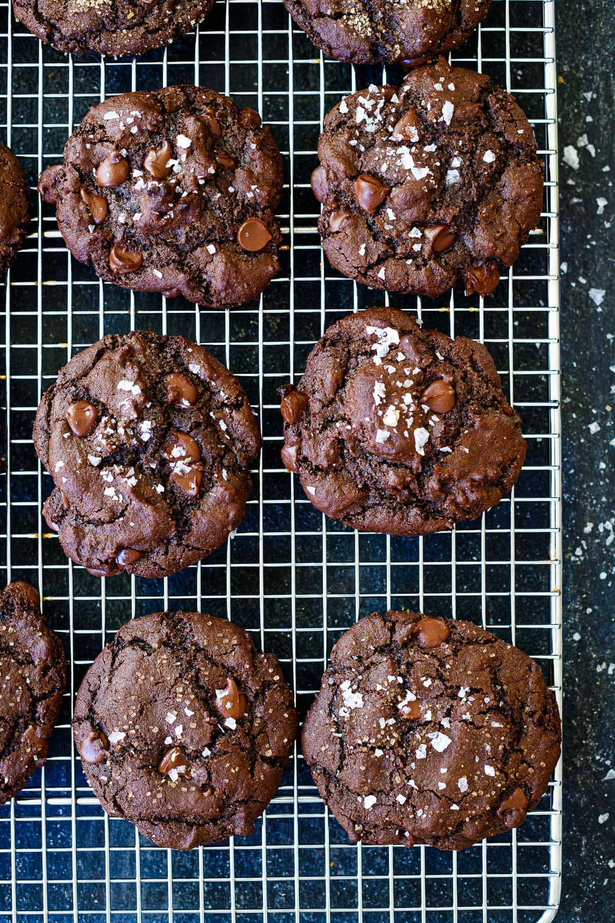baked double chocolate chip cookies cooling on wire rack