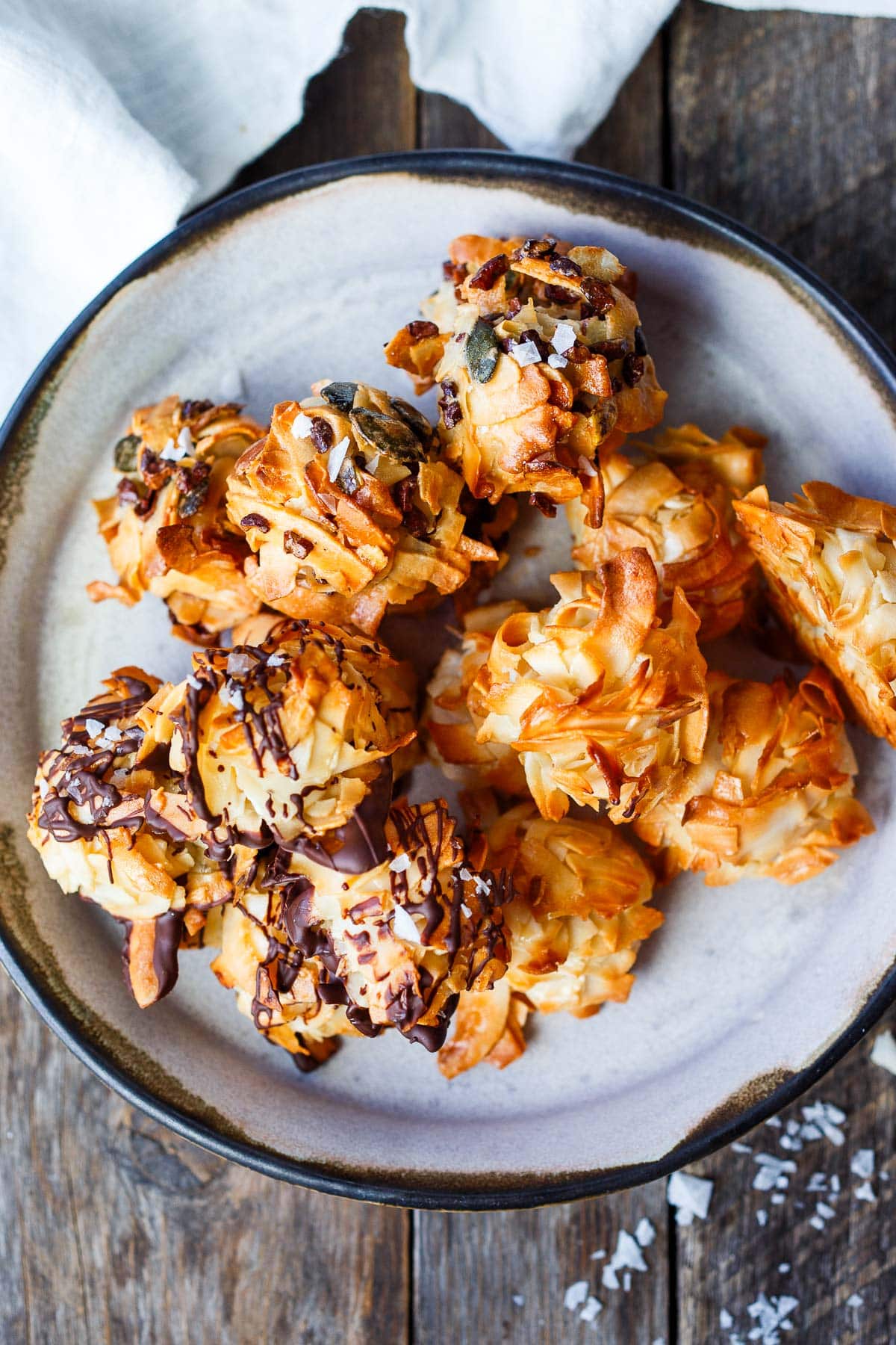 Tender, delicious Coconut Macaroons made with wide coconut chips are the perfect combo of crunchy and chewy. Gluten-free.