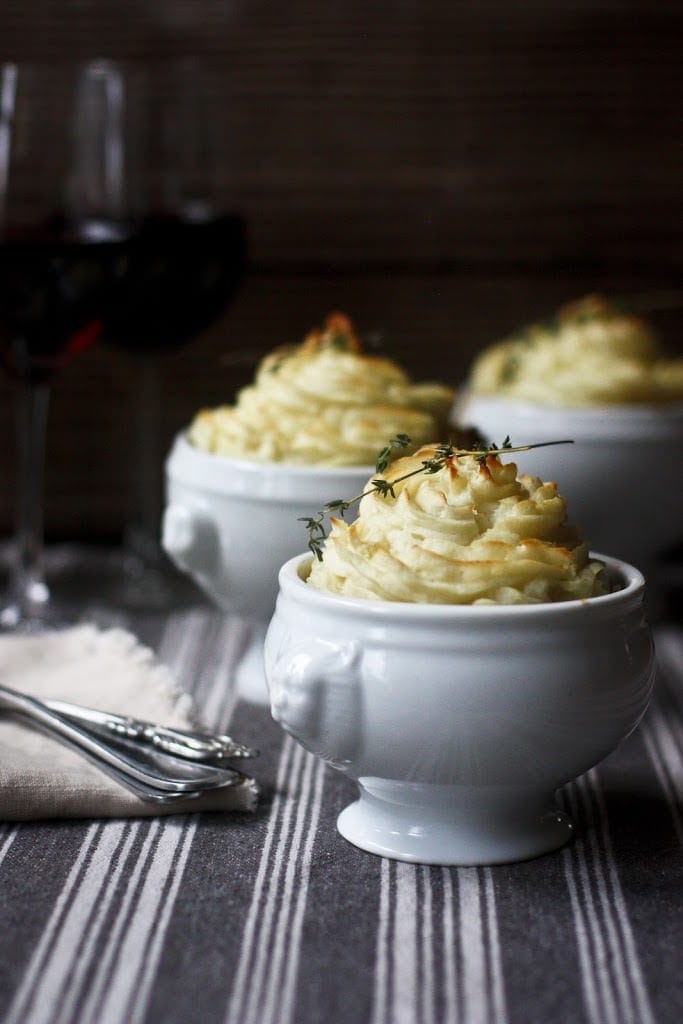 Vegan Shepherds Pie Vegan Shepherds Pie with mushrooms and root vegetables- topped with pillowy mashed potatoes. A delicious vegan main dish -perfect for the holiday table. #sheperdspie #vegan