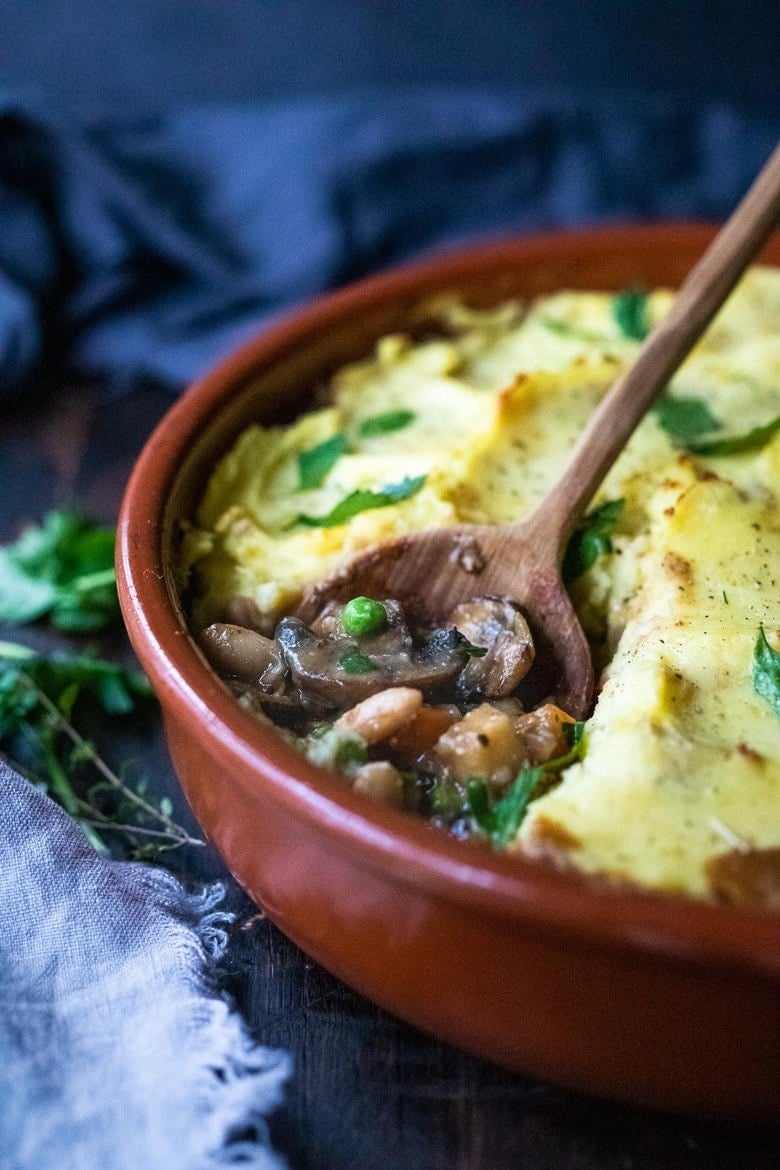 This Vegetarian Shepherds Pie recipe has a savory mushroom and root vegetable filling, topped with creamy, pillowy mashed potatoes. Vegan-adaptable. Video!