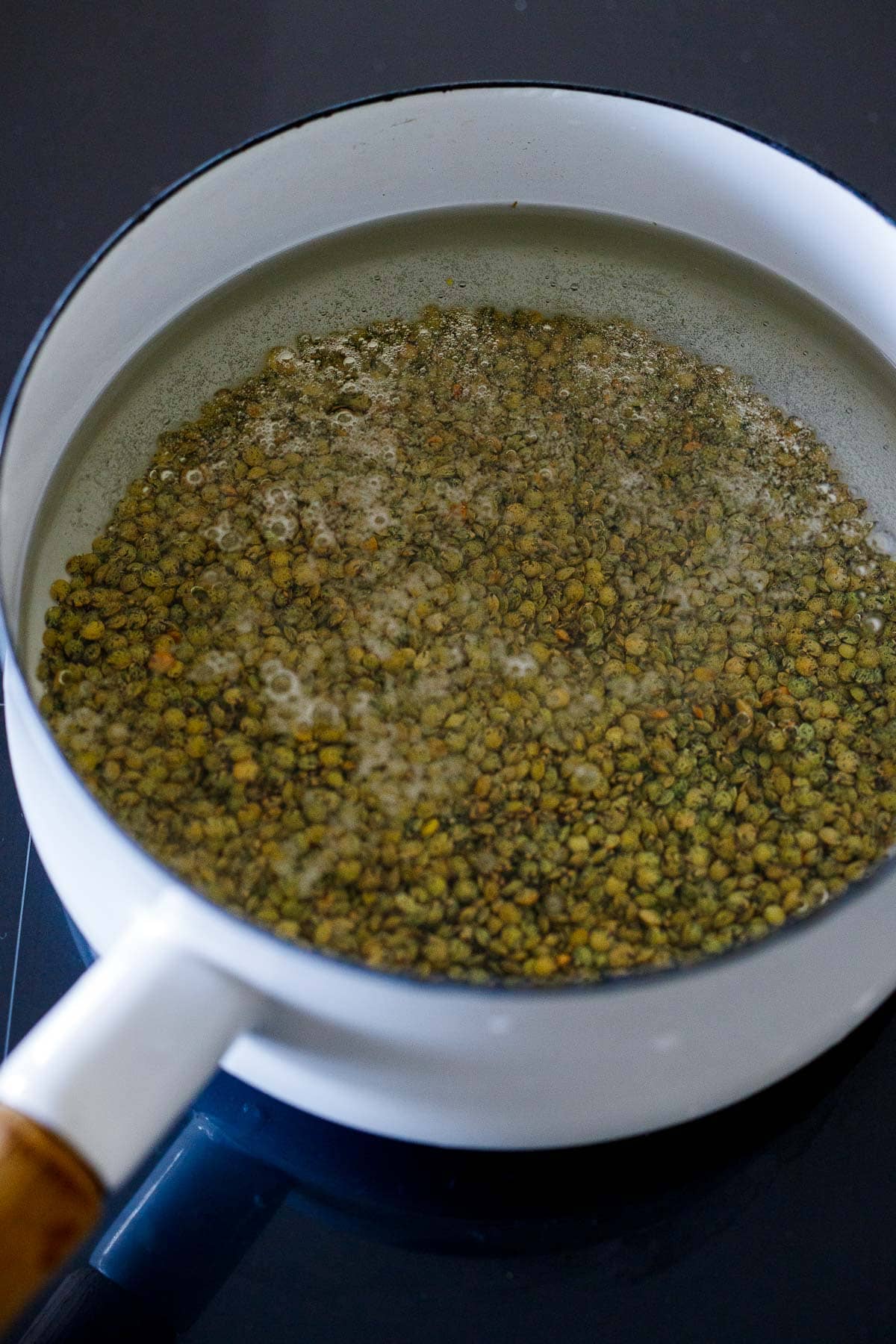 lentils in pot with water.