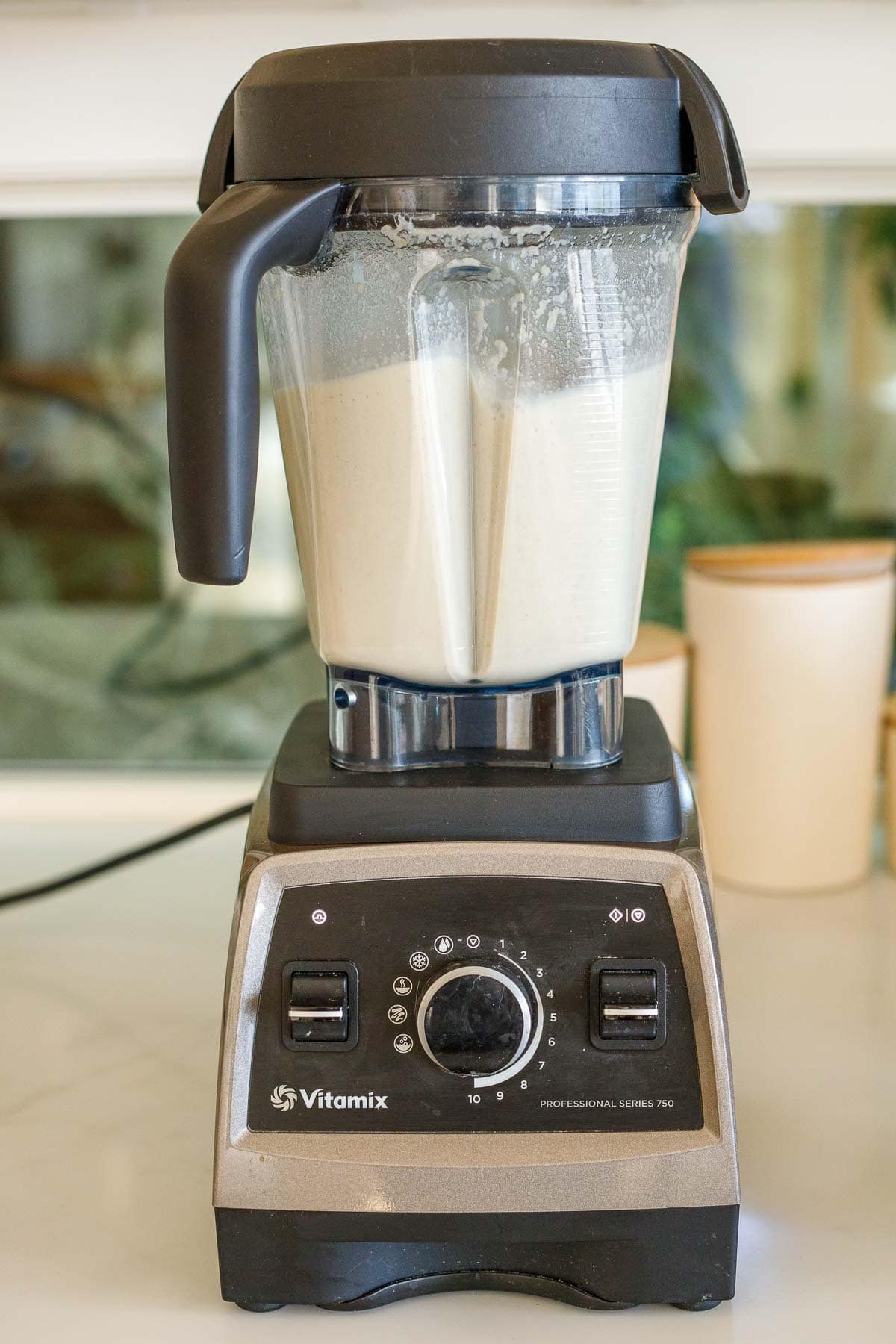 vitamix blender blending ajo blanco white gazpacho until smooth.