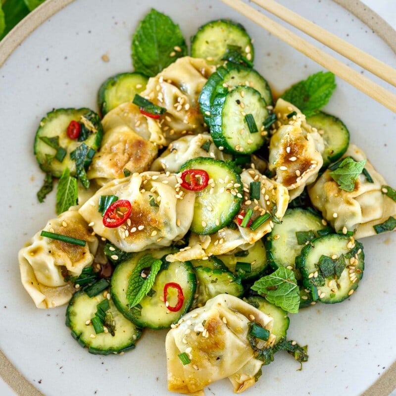 Wonton Salad recipe: Crispy wontons are tossed with crisp cucumbers, ginger, chilies, chives, garlic, and fresh mint in a simple Asian Dressing.