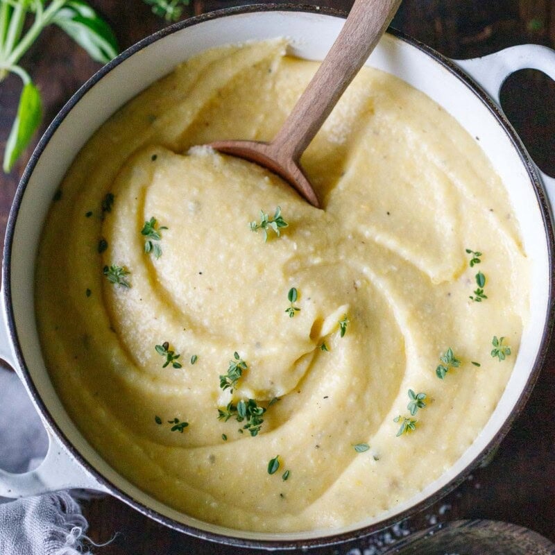 creamy polenta recipe in a white saucepan