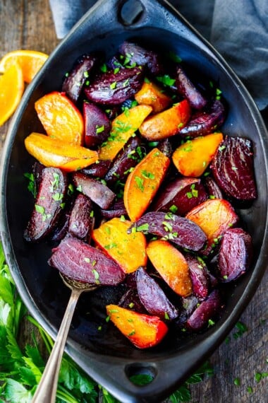 Learn the secret to delicious roasted beets without peeling them! Tender and caramelized, these oven-roasted beets make a lovely side dish. Vegan and gluten-free.