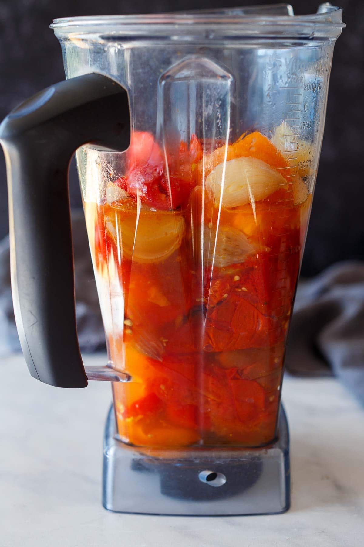 roasted tomatoes, peppers, and shallot in blender. 