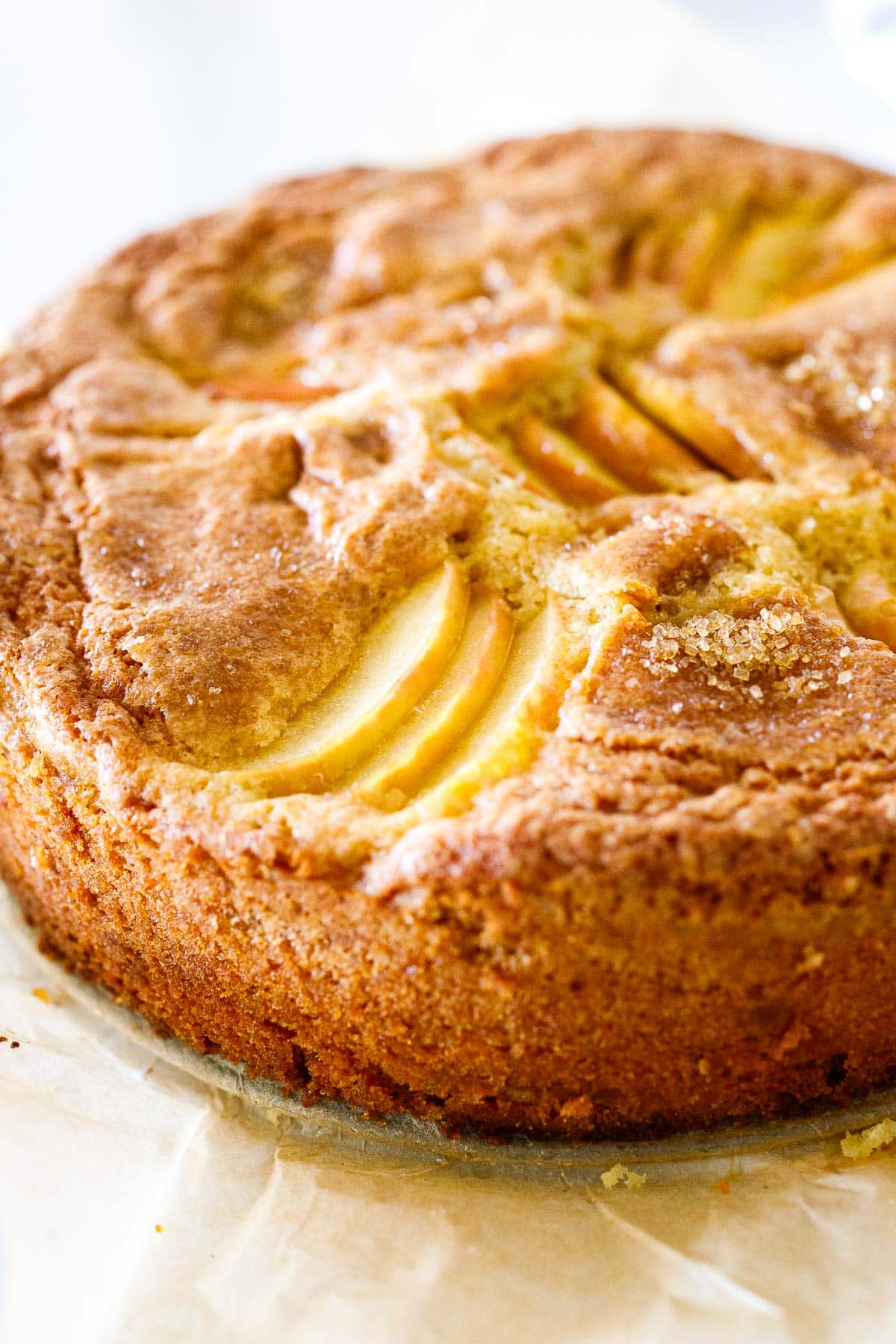 baked apple cake with crackly sugar topping. 