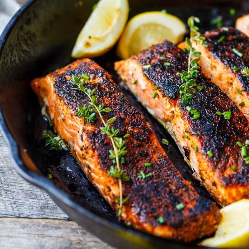 Seared Blackened Salmon is easy to make in 20 minutes! Salmon filets are coated with a zesty homemade cajun blackened salmon seasoning, creating a perfect crust while keeping the salmon juicy and tender.
