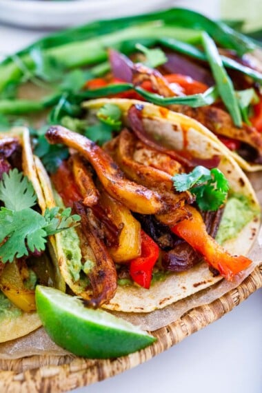 This vegan fajita recipe is easy and delicious! With just 15 mins of prep, you'll have happy mouths in no time! Made with oyster mushrooms & optional tofu.