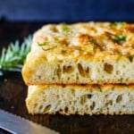 Hands down, this is the best focaccia bread recipe we've ever made! Topped with flaky sea salt and fresh rosemary, it's golden and airy with a crispy bottom. Easy to make. Vegan.
