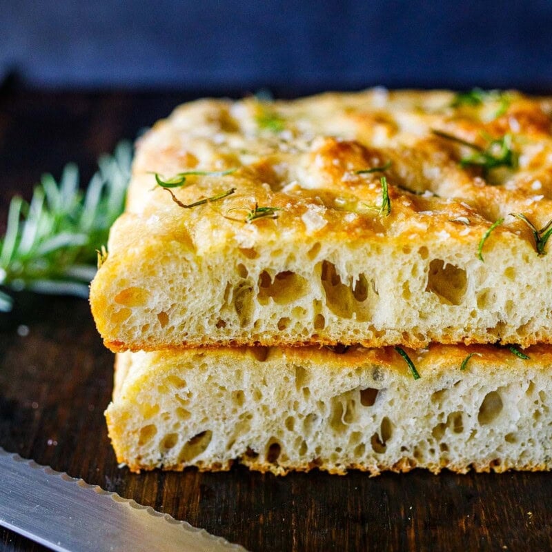 Hands down, this is the best focaccia bread recipe we've ever made! Topped with flaky sea salt and fresh rosemary, it's golden and airy with a crispy bottom. Easy to make. Vegan.
