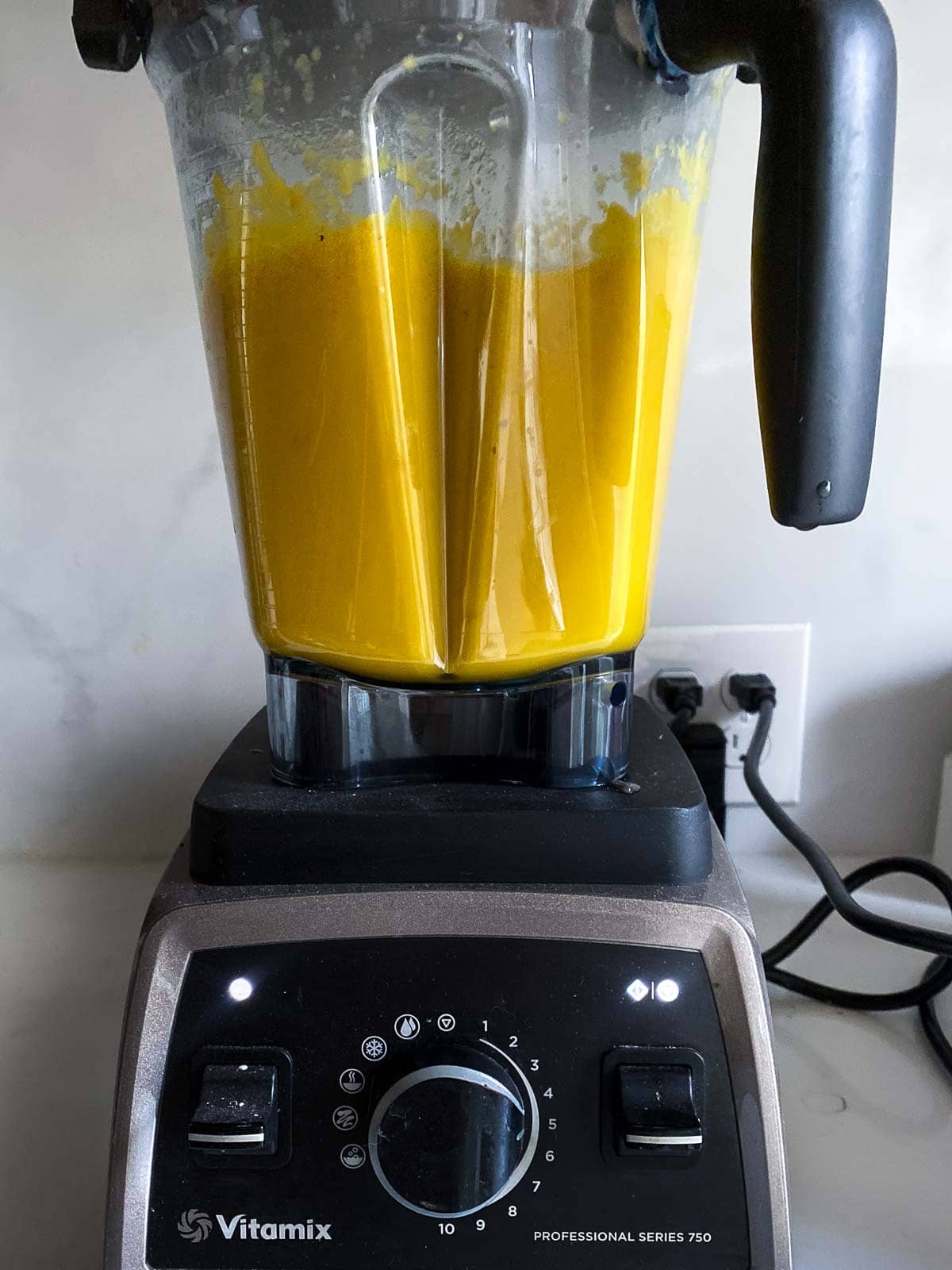 smooth carrot ginger soup in a blender. 