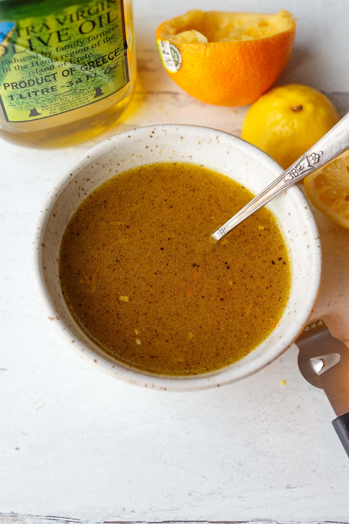 bowl and fork with whisked together citrus vinaigrette.