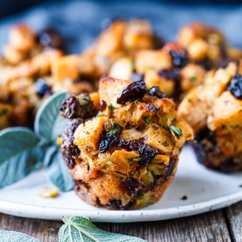 These savory Thanksgiving Stuffing Muffins are bold in flavor with Italian sausage, dried cherries and sage. Perfect for the holiday table, they are easy and delicious! Vegetarian-adaptable.