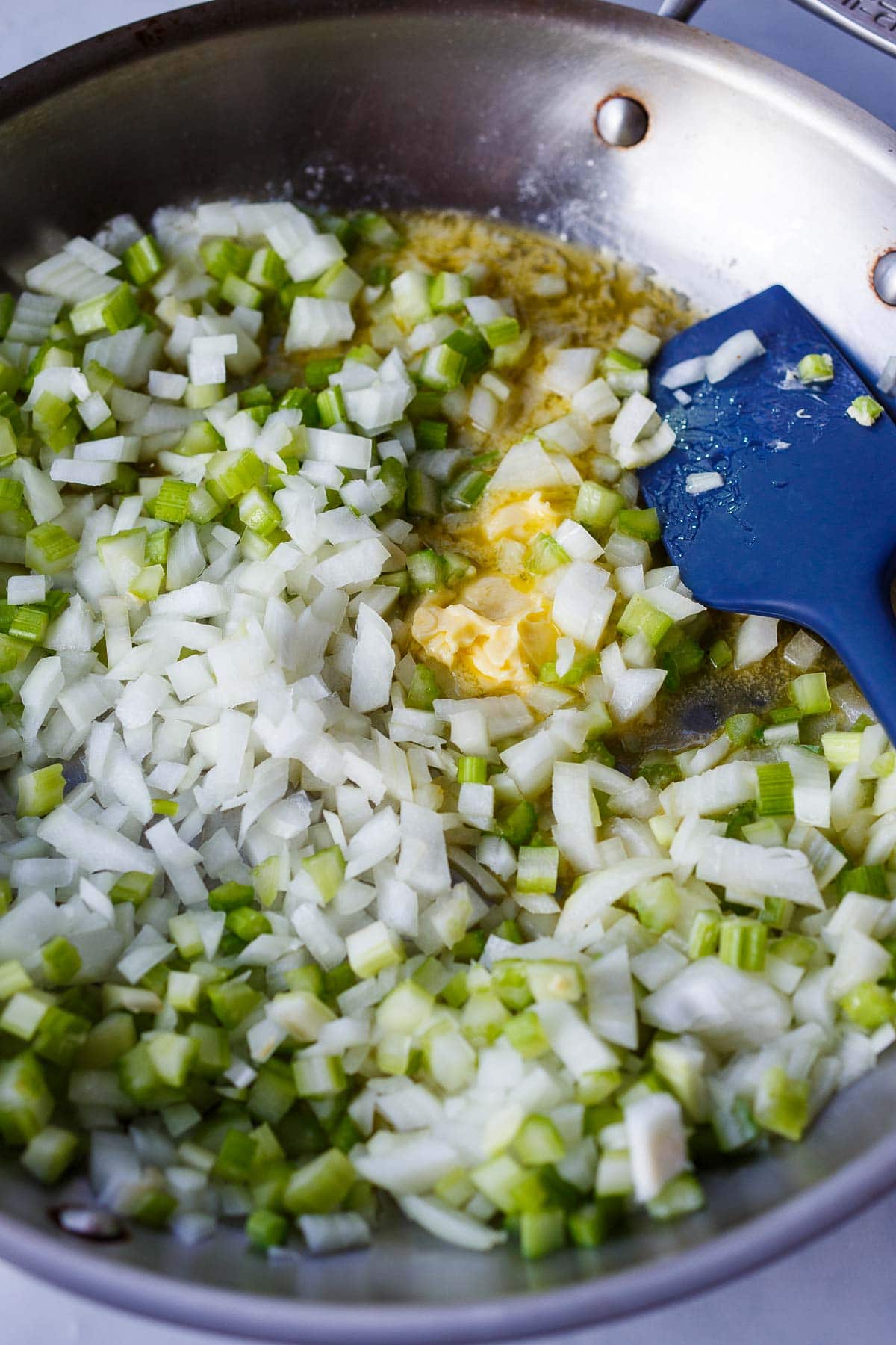Celery, onions and butter in a saute pan.