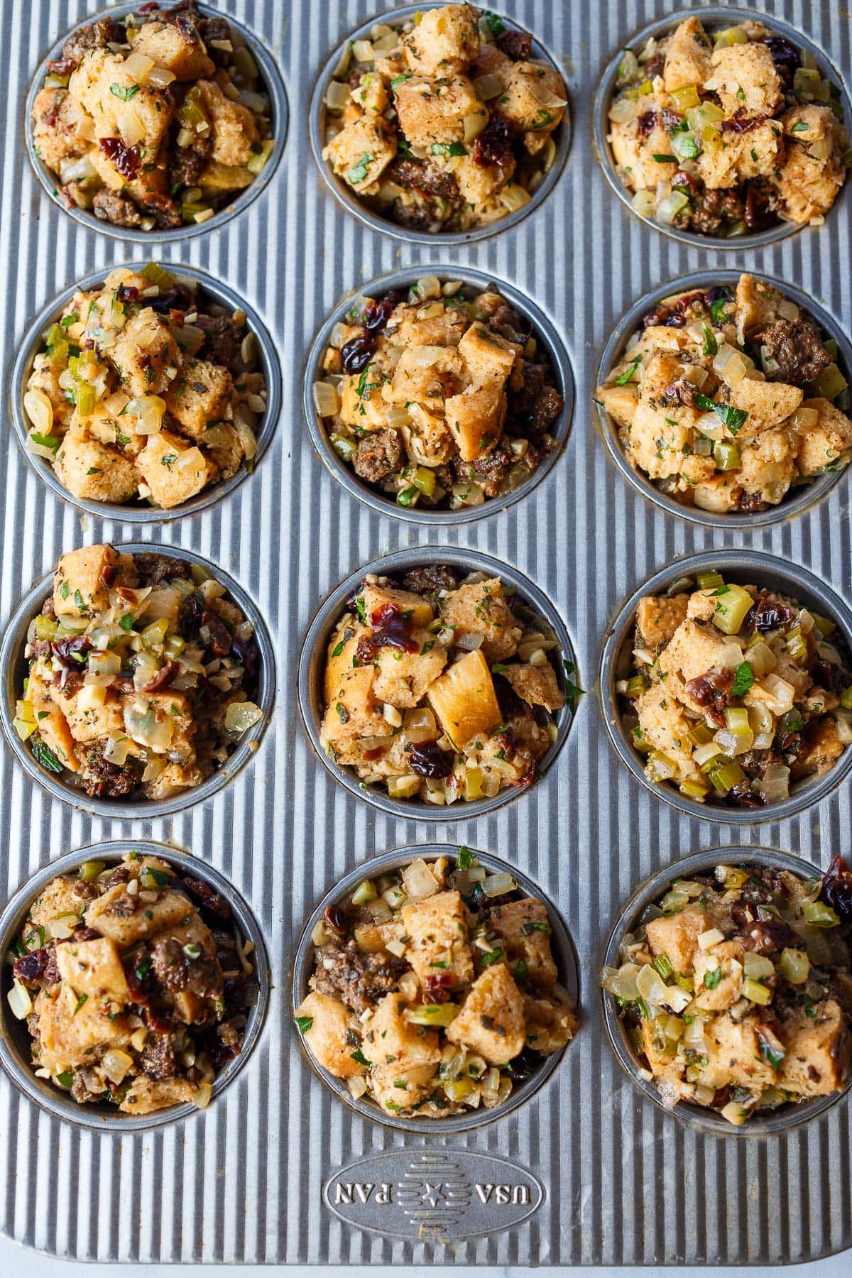 Stuffing in muffin tins.
