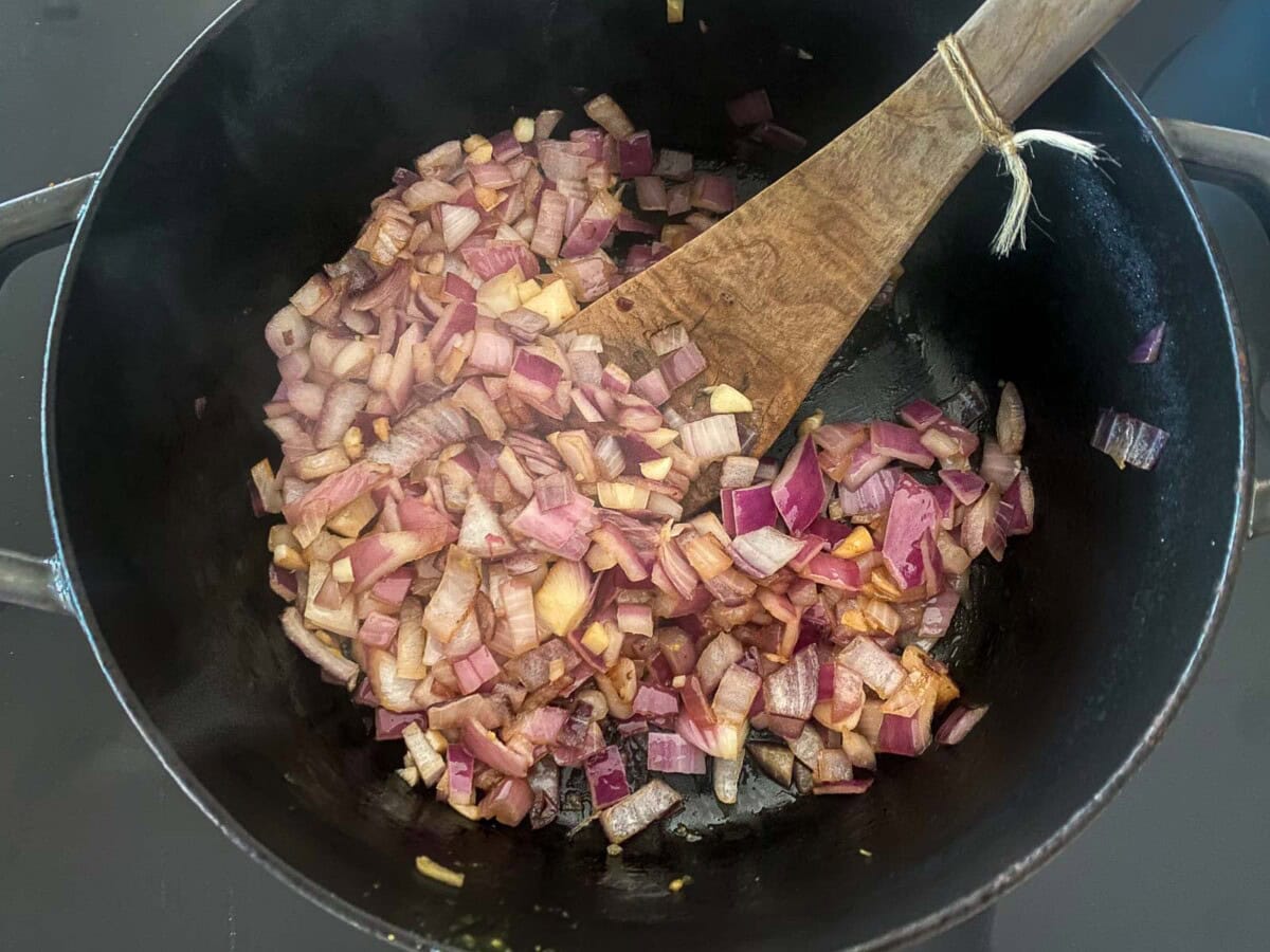 large pot with onions and garlic.
