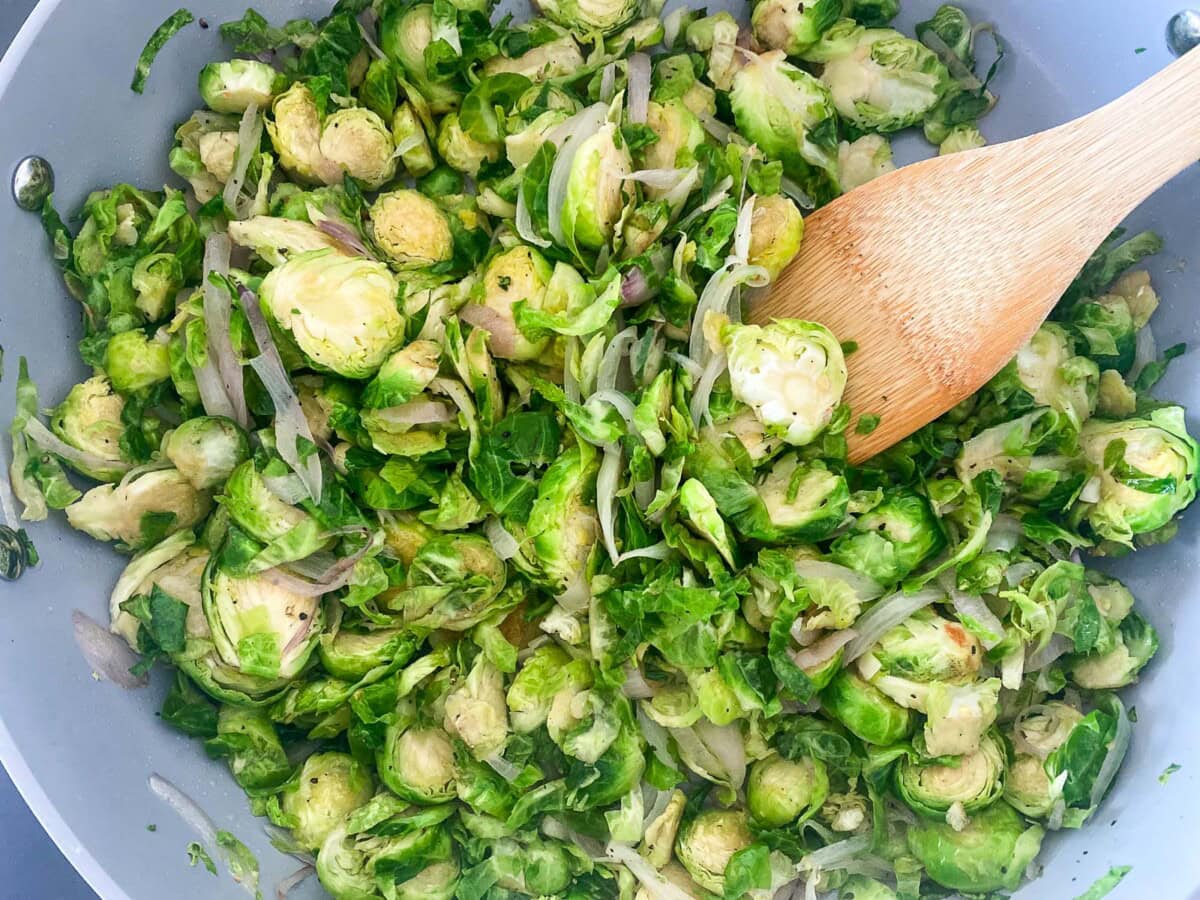 skillet with sauteed Brussels sprouts, shallots, and garlic. 