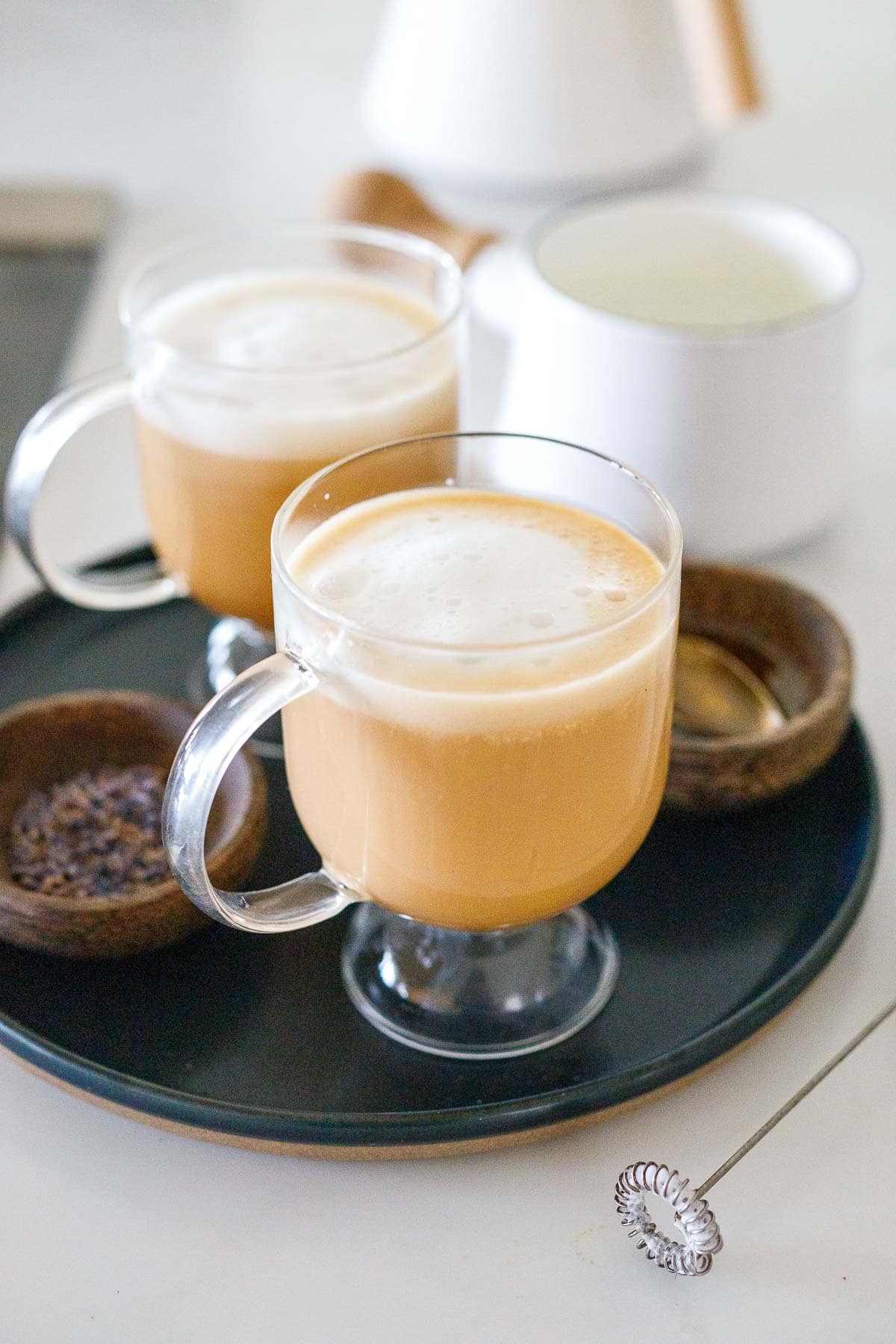 london fog lattes in glass mugs with frothed milk. 