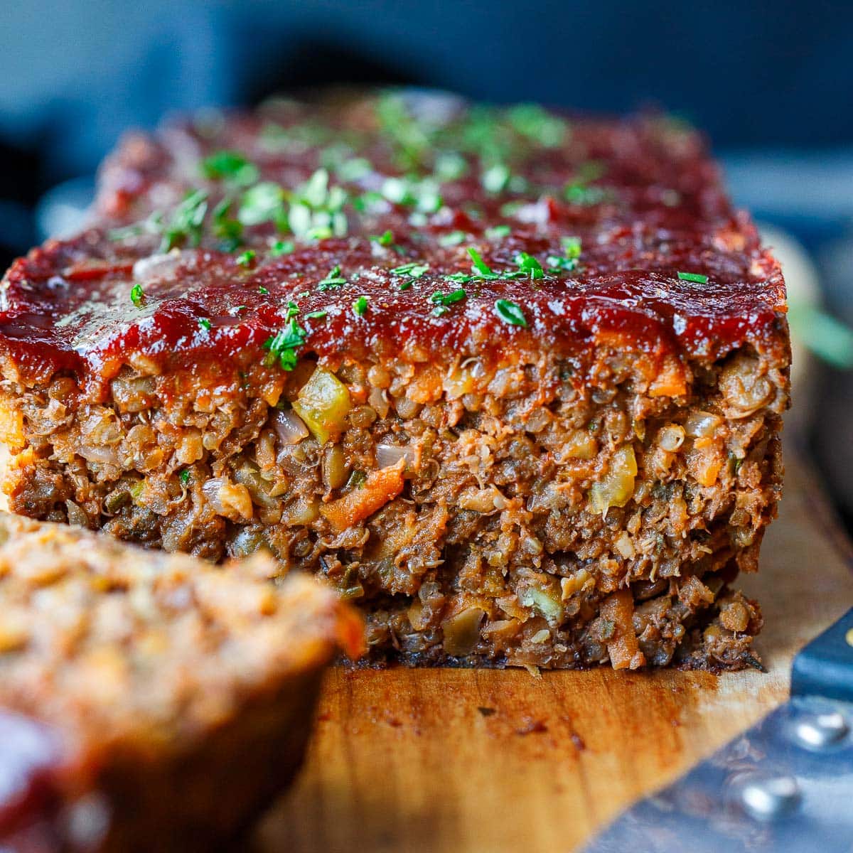 This hearty Vegan Meatloaf is full of flavor and succulent texture. Lentils and quinoa pack it with plant protein, delivering a wholesome and satisfying meal. Gluten-free