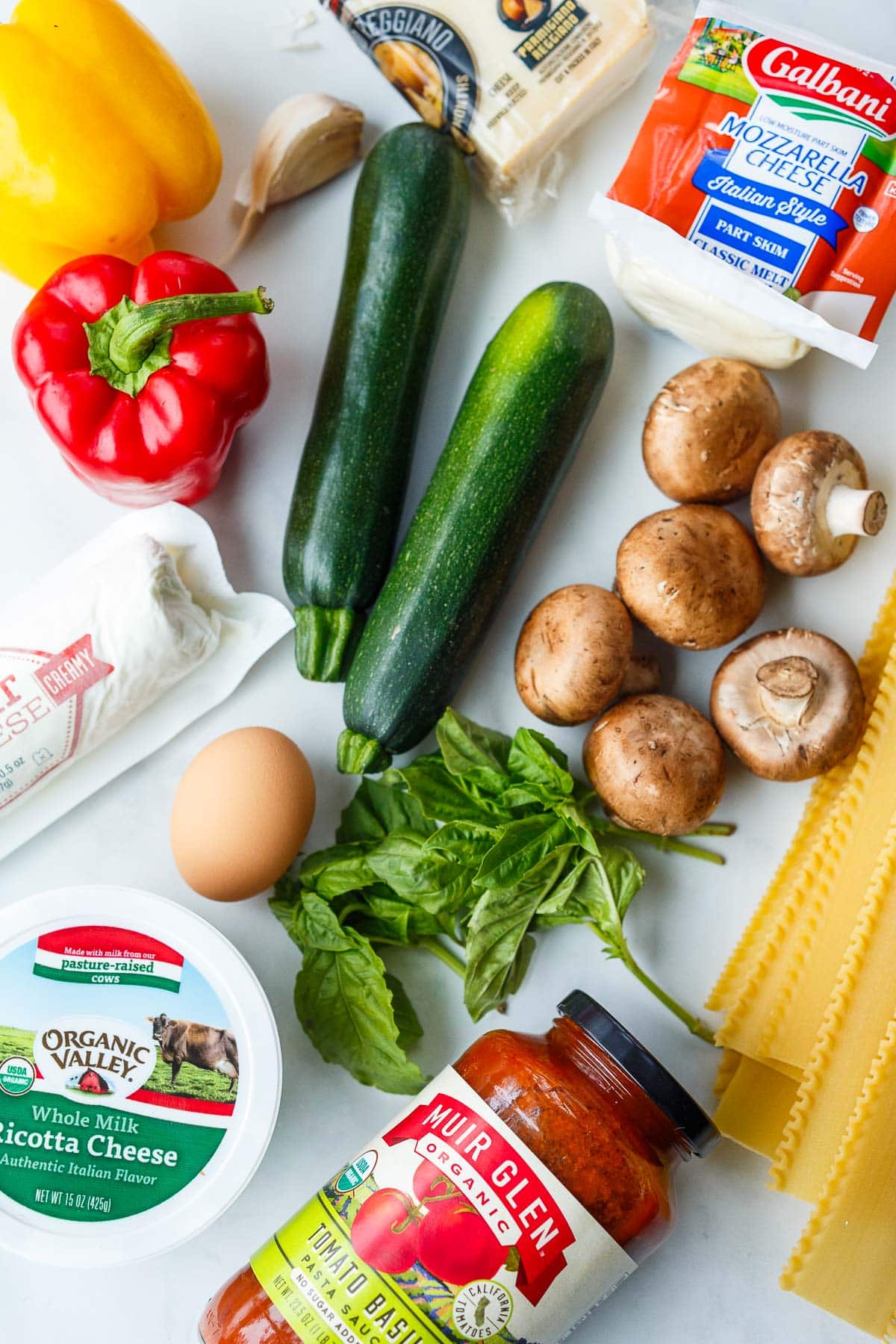 Ingredients laid out for vegetable lasagna.