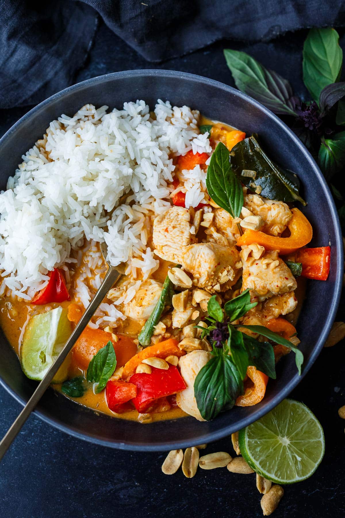 Rich and delicious homemade Panang Curry is made with tender chicken and sweet bell peppers in a creamy coconut curry sauce.