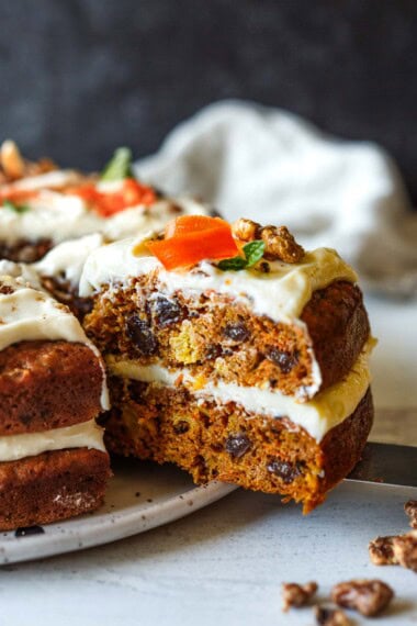 Moist and chock full of carrots, this delightful Carrot Cake recipe with cream cheese frosting offers a lightened-up version that doesn’t compromise on flavor.
