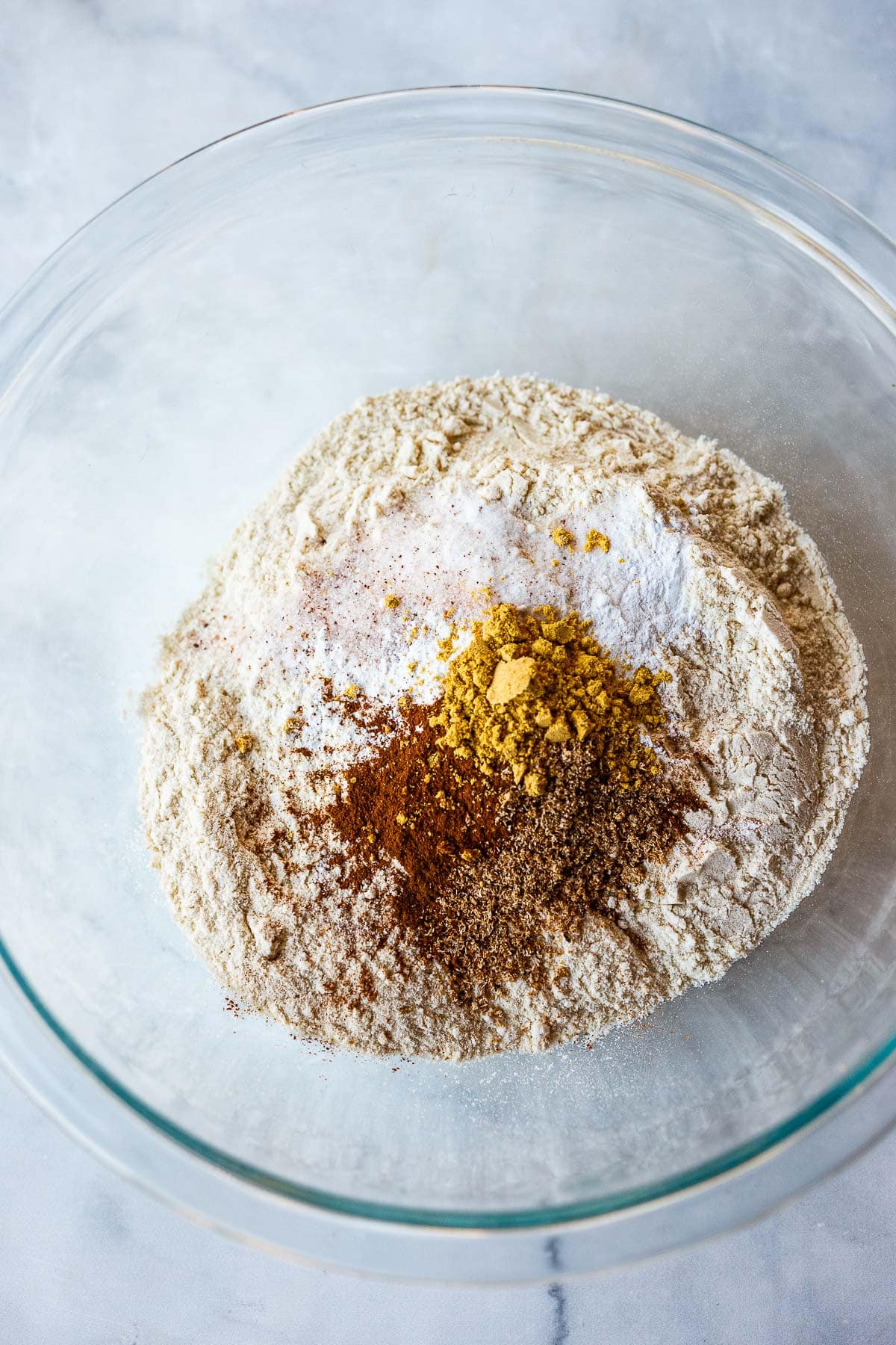 glass mixing bowl with dry ingredients. 