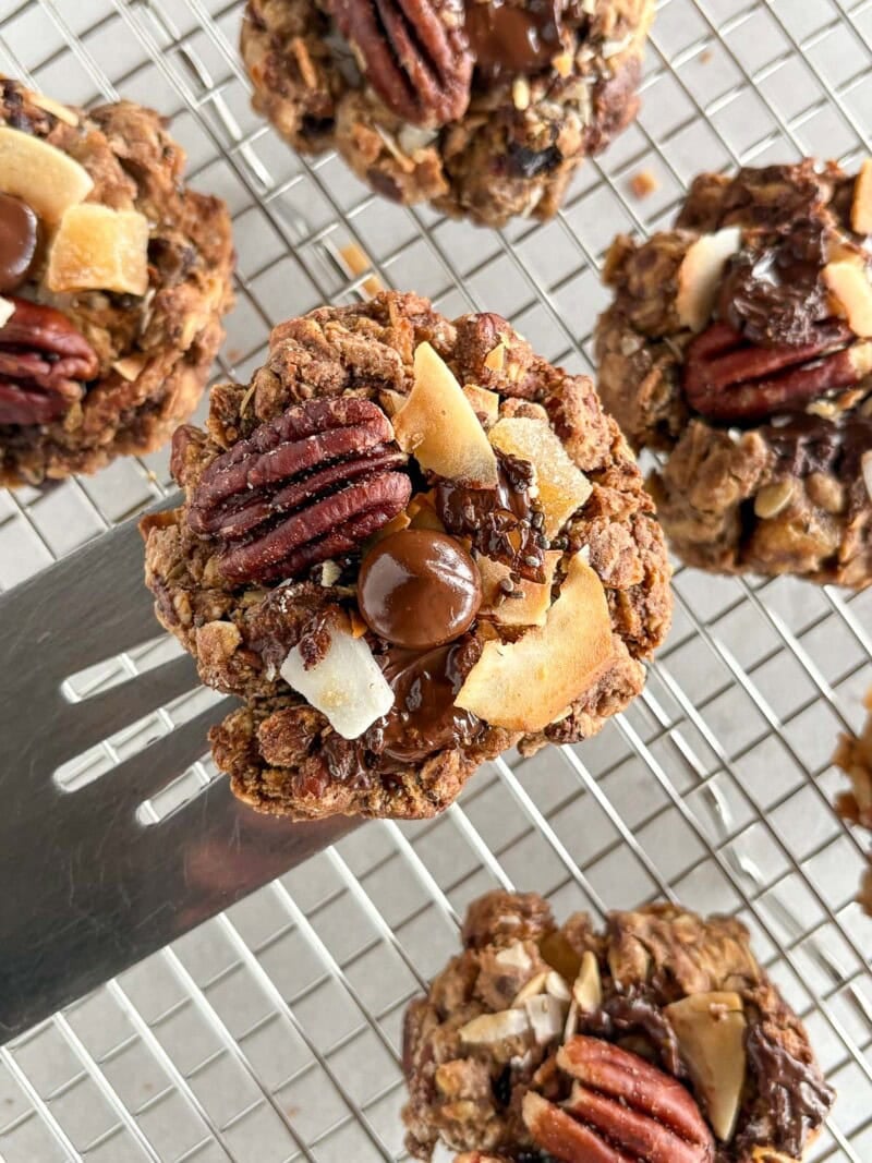 Full of texture and delicious flavor, Cowgirl Cookies are made with coconut, pecans, oats, dark chocolate, cinnamon and ginger. Gluten-free and vegan-adaptable.