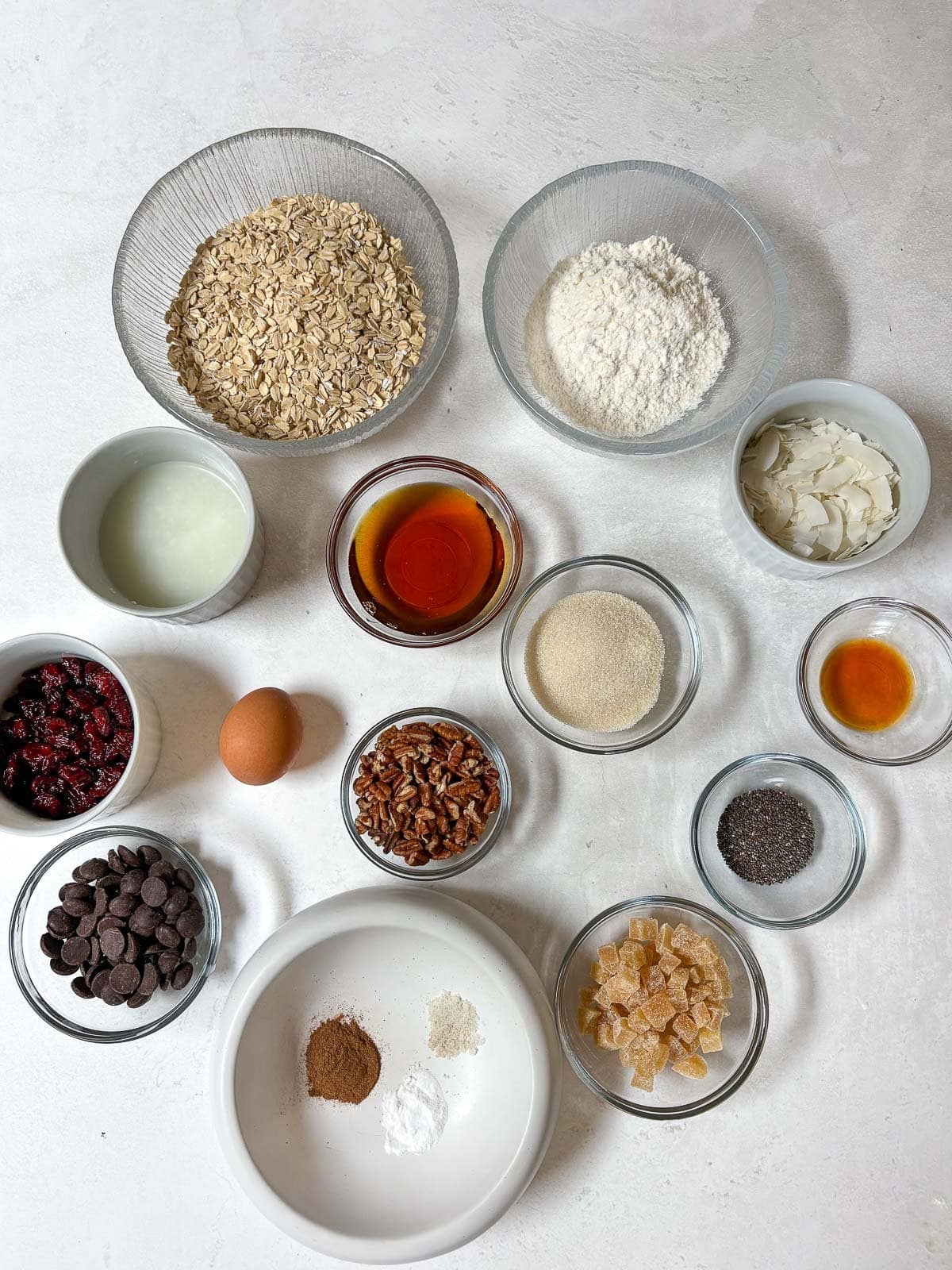 ingredients for cowgirl cookies arranged neatly in bowls. 