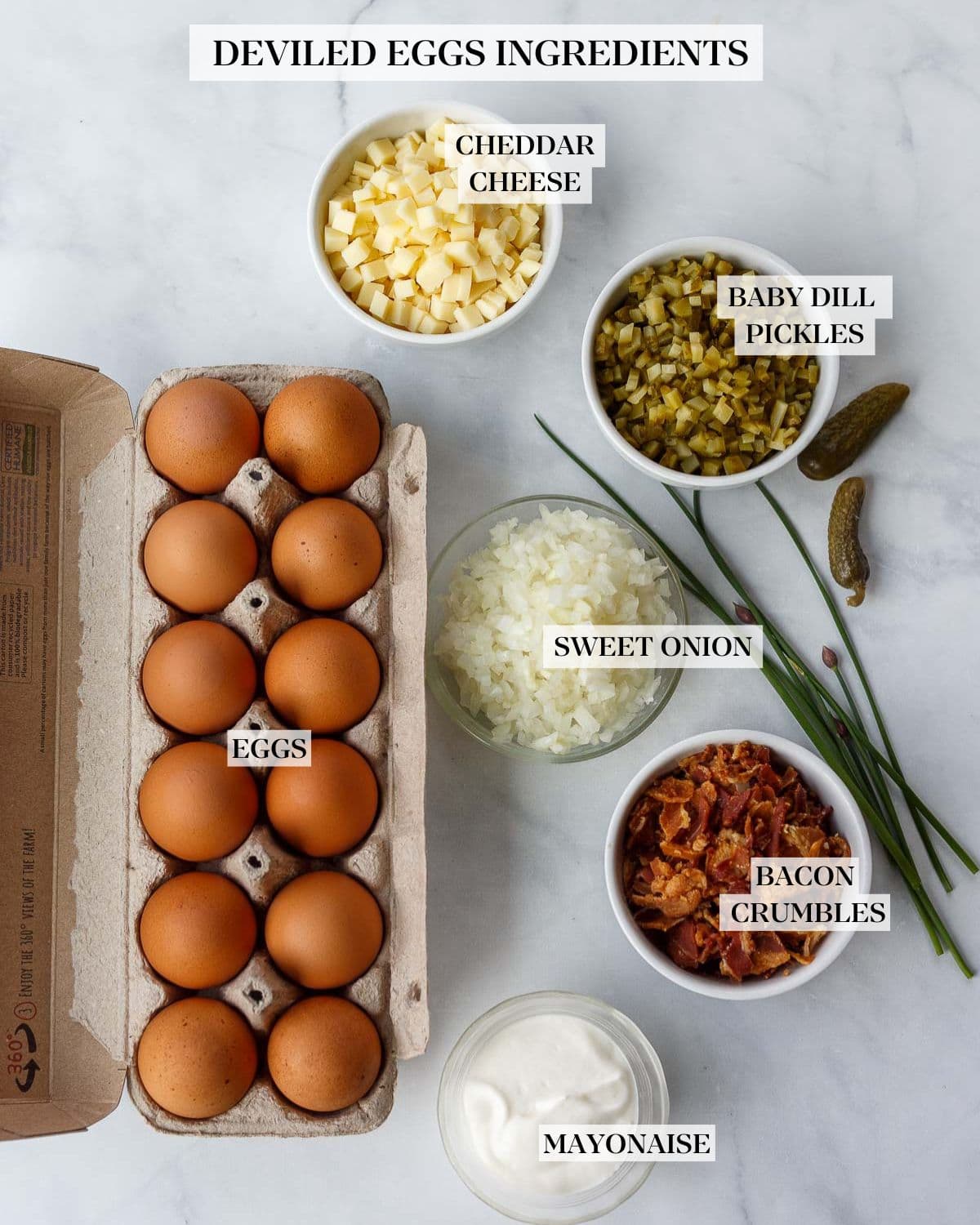 Deviled Eggs recipe ingredients on a white counter. 