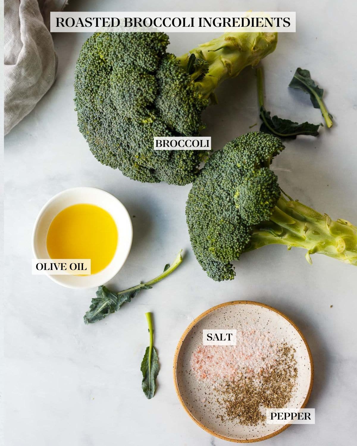 roasted broccoli ingredients on a white counter. 