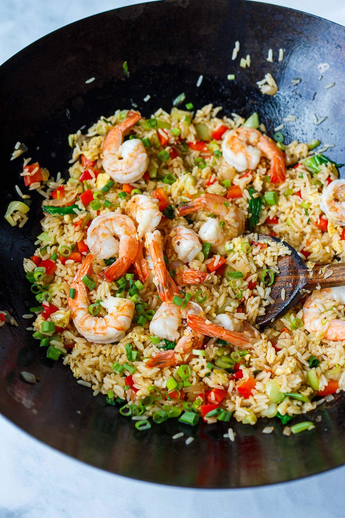 wok with thai fried rice with shrimp.