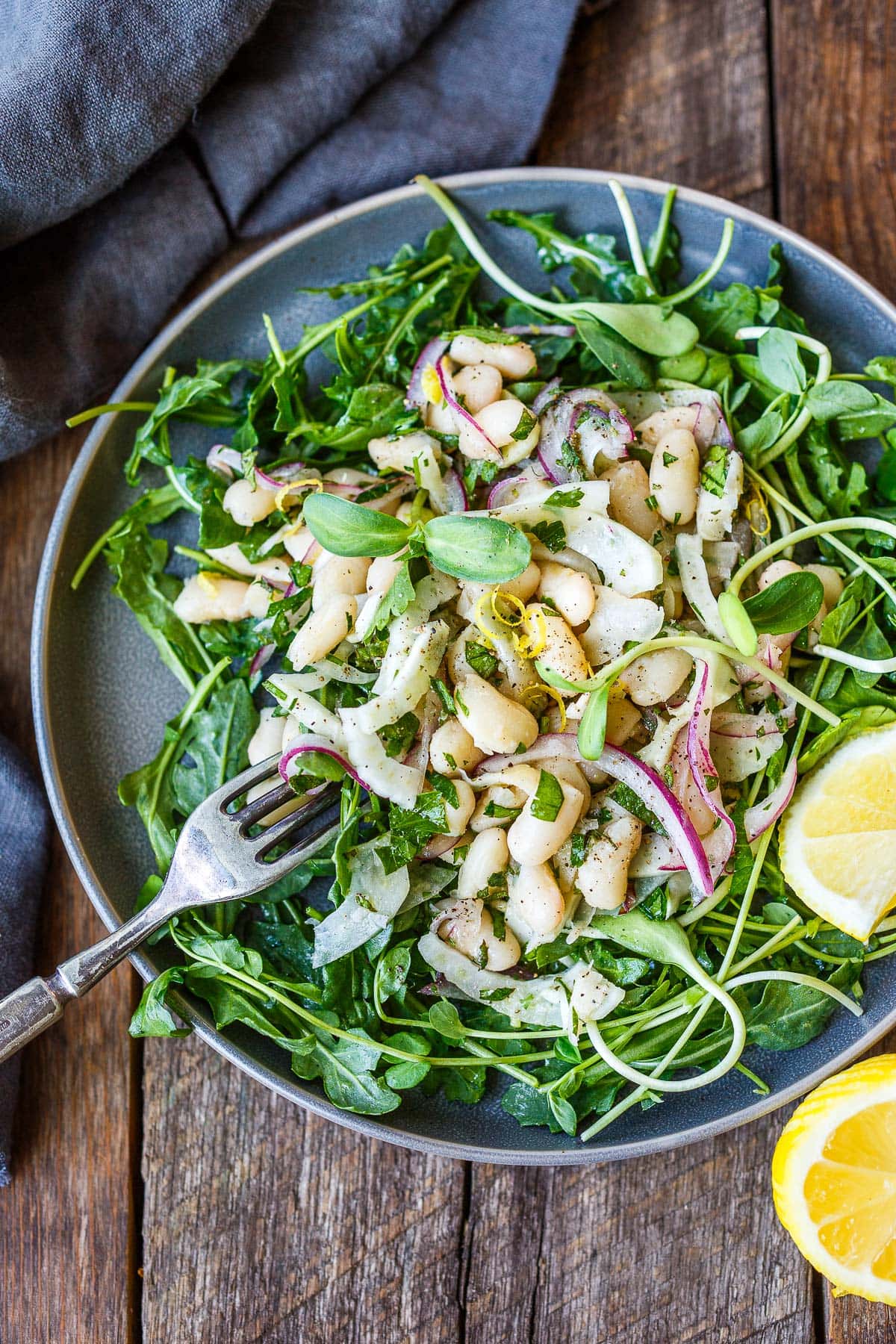 This simple white bean salad is easy to throw together, perfect for potlucks and gatherings or a quick, healthy meal! Vegan and gluten-free.