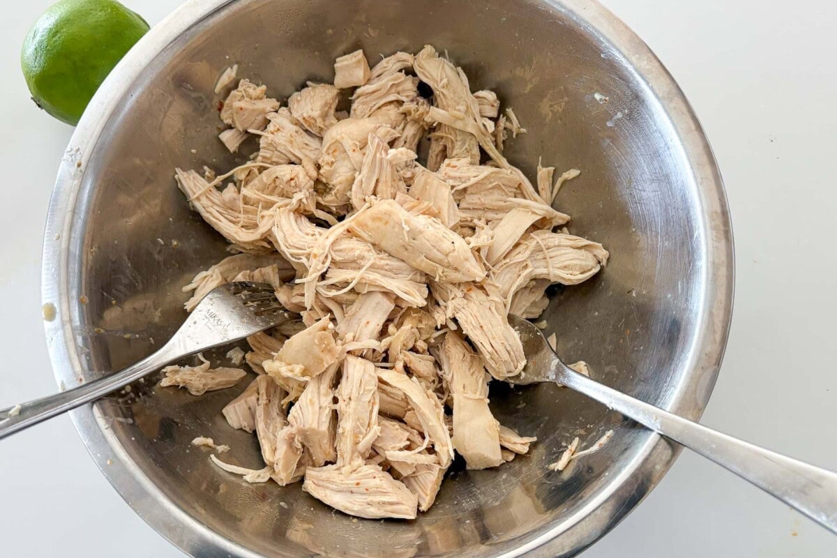 shredding the chicken.